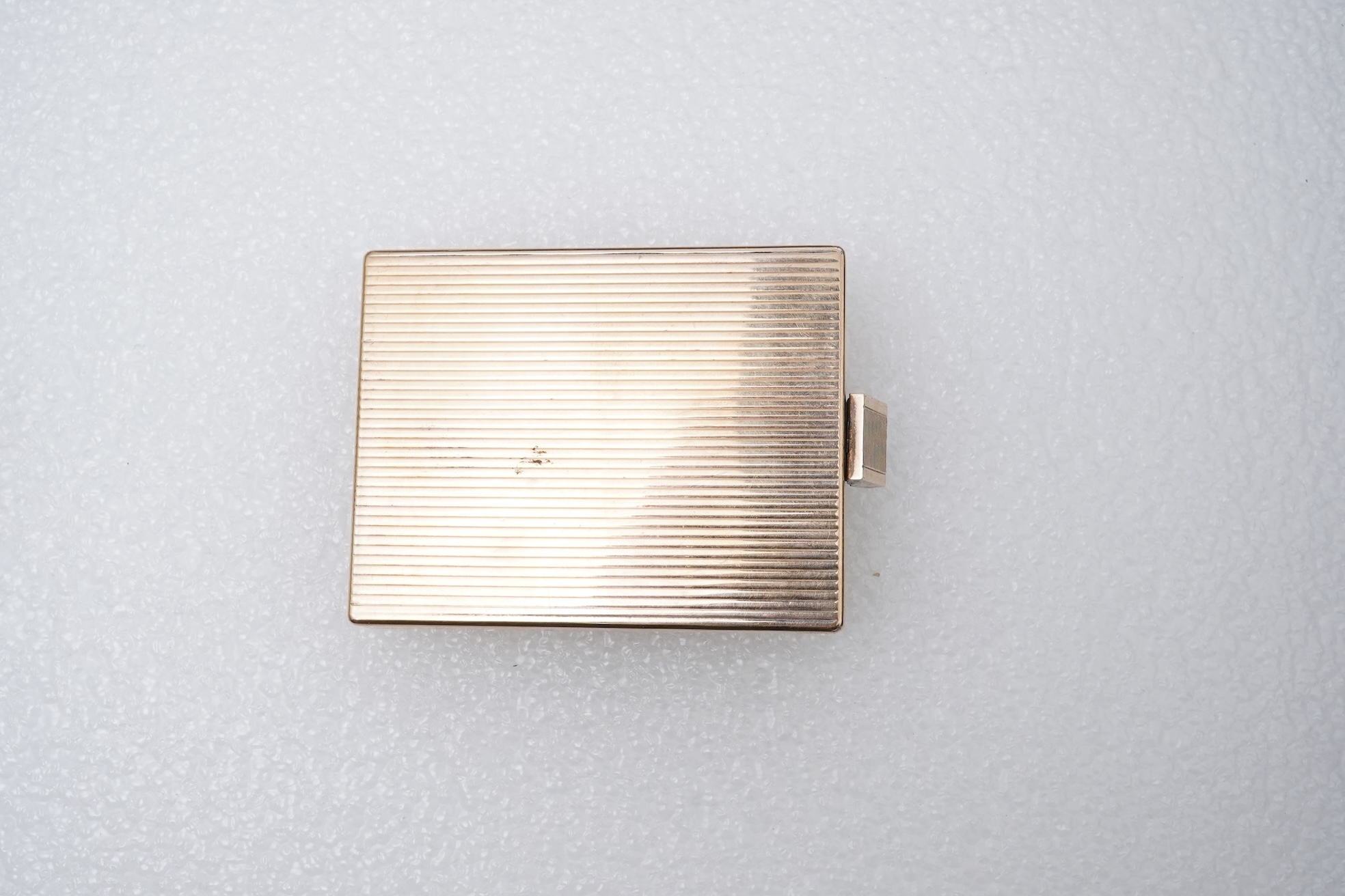 Boucheron, a silver gilt and ruby vanity case, France, 1940s